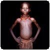 Photo couleur d'un habitant de la vallée Omo (Éthiopie) par John Kenny